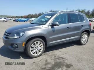 2015 Volkswagen Tiguan SEL с VIN WVGBV7AX5FW603056, выставлен на аукционе Copart как лот 69210935 с пробегом 148 567 миль миль и Чистый • Clean title. История ставок и продаж доступна на DreamBid. Изображение 1.