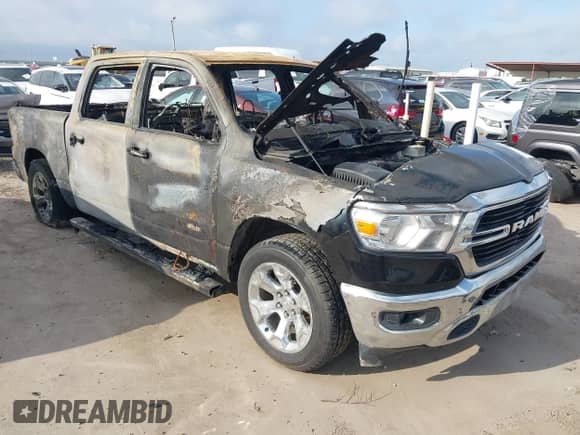 2020 Ram 1500 Big Horn z VIN 1C6RREFT5LN210930, wystawiony jako IAAI lot #42668858 z przebiegiem 127 071 mil mil oraz . Historia ofert i sprzedaży dostępna na DreamBid. Obrazek 1.