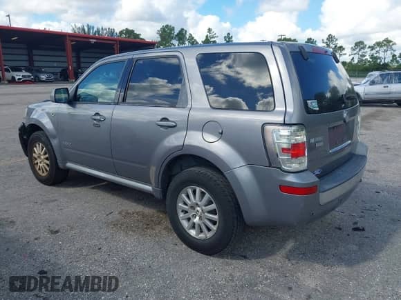 2008 Mercury Mariner Premier with VIN 4M2CU97118KJ53310, listed as a IAAI auction lot 43251176 with 22,170 mi miles and . Bid and sale history available at DreamBid. Image 3.