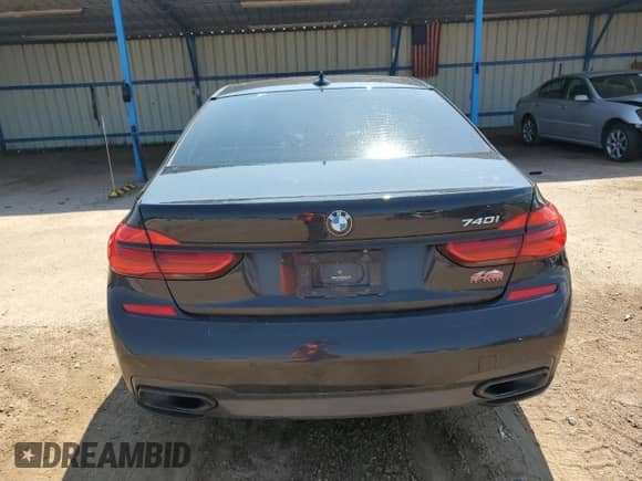 2019 BMW 7 Series 740i with VIN WBA7E2C57KB217133, listed as a Copart auction lot 70962405 with 99,965 mi miles and Clean title. Bid and sale history available at DreamBid. Image 6.