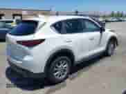 2023 Mazda CX-5 S Carbon Edition z VIN JM3KFBCM9P0286384, wystawiony jako IAAI lot #42497951 z przebiegiem 9 448 mil mil oraz . Historia ofert i sprzedaży dostępna na DreamBid. Obrazek 4.