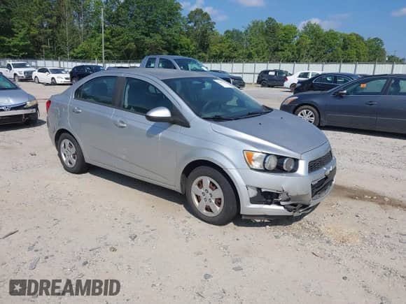 2015 Chevrolet Sonic LS with VIN 1G1JB5SH0F4127419, listed as a IAAI auction lot 42699223 with 120,047 mi miles and . Bid and sale history available at DreamBid. Image 1.