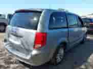 2014 Dodge Grand Caravan American Value with VIN 2C4RDGBG5ER422065, listed as a IAAI auction lot 41901695 with 215,826 mi miles and . Bid and sale history available at DreamBid. Image 4.