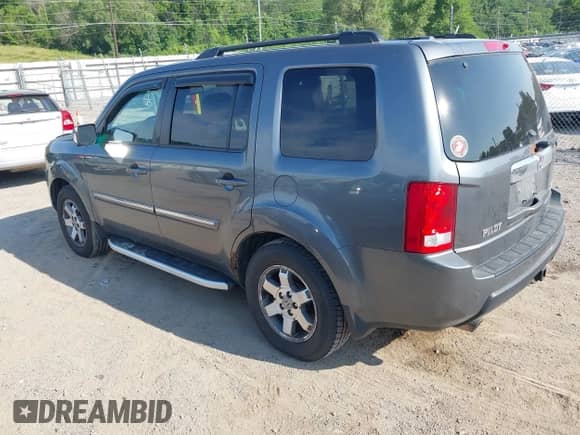 2010 Honda Pilot Touring with VIN 5FNYF4H88AB012001, listed as a IAAI auction lot 42635771 with 287,115 mi miles and . Bid and sale history available at DreamBid. Image 3.