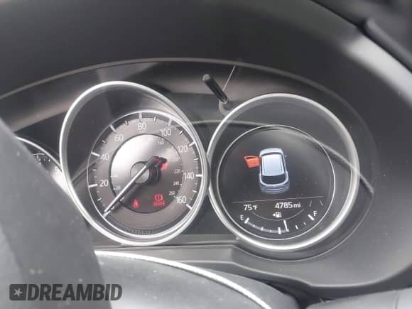 2023 Mazda CX-5 S Carbon Edition z VIN JM3KFBCMXP0132086, wystawiony jako IAAI lot #37026489 z przebiegiem 4 785 mil mil oraz . Historia ofert i sprzedaży dostępna na DreamBid. Obrazek 7.