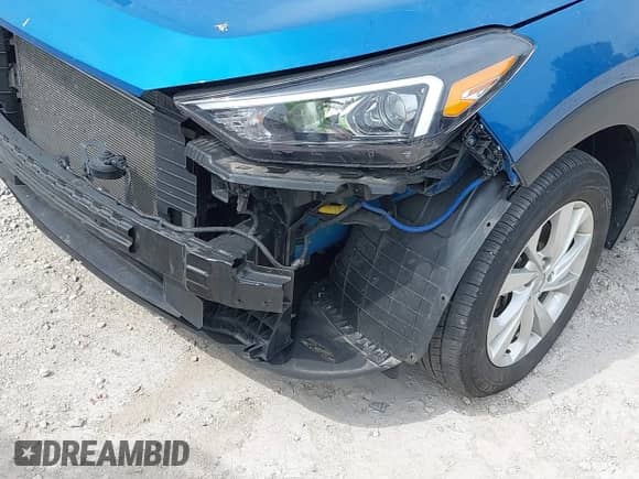 2019 Hyundai Tucson SE z VIN KM8J23A40KU886328, wystawiony jako IAAI lot #39500657 z przebiegiem 56 117 mil mil oraz . Historia ofert i sprzedaży dostępna na DreamBid. Obrazek 18.