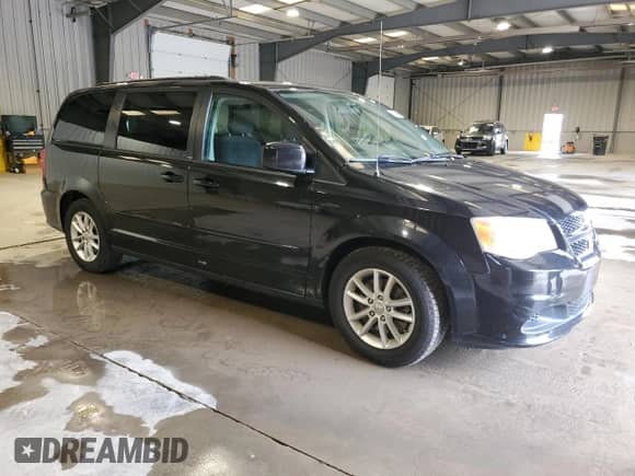 2014 Dodge Grand Caravan SXT 30th Anniversary with VIN 2C4RDGCG5ER128213, listed as a Copart auction lot 65019185 with 169,652 mi miles and Clean title. Bid and sale history available at DreamBid. Image 4.