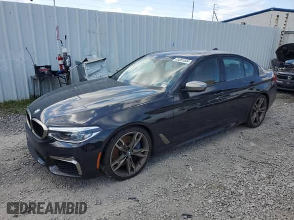 2020 BMW 5 Series M550i xDrive with VIN WBAJS7C04LBN96223, listed as a Copart auction lot 69381004 with 60,912 mi miles and Salvage title. Bid and sale history available at DreamBid. Image 1.