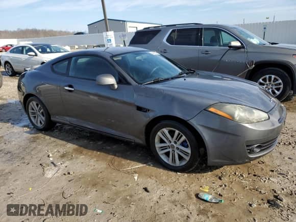 2007 Hyundai Tiburon GS с VIN KMHHM66D47U256547, выставлен на аукционе Copart как лот 44063375 с пробегом 191 443 миль миль и На запчасти • Non repairable. История ставок и продаж доступна на DreamBid. Изображение 4.