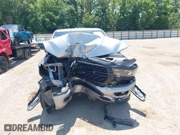 2022 Ram 1500 Big Horn with VIN 1C6SRFBT9NN376545, listed as a IAAI auction lot 42639967 with 77,833 mi miles and . Bid and sale history available at DreamBid. Image 6.