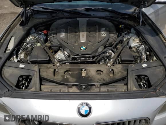 2016 BMW 5 Series 550i z VIN WBAKN9C53GD962850, wystawiony jako Copart lot #58147585 z przebiegiem 149 381 mil mil oraz Szkoda całkowita • Salvage title. Historia ofert i sprzedaży dostępna na DreamBid. Obrazek 11.