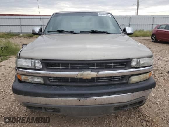 1999 Chevrolet Silverado 1500 LS z VIN 2GCEK19V1X1142506, wystawiony jako Copart lot #69878094 z przebiegiem 87 683 mil mil oraz Czysty tytuł • Clean title. Historia ofert i sprzedaży dostępna na DreamBid. Obrazek 5.