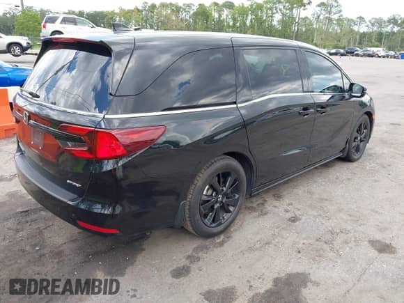 2023 Honda Odyssey Sport z VIN 5FNRL6H76PB068270, wystawiony jako IAAI lot #42528174 z przebiegiem 126 063 mil mil oraz . Historia ofert i sprzedaży dostępna na DreamBid. Obrazek 4.