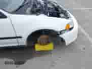 1993 Honda Civic z VIN 1HGEJ1161PL052453, wystawiony jako IAAI lot #41915593 z przebiegiem 298 387 mil mil oraz . Historia ofert i sprzedaży dostępna na DreamBid. Obrazek 12.