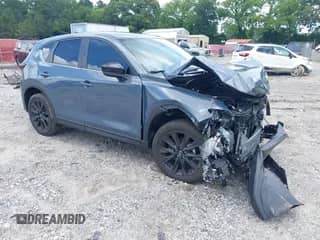 2024 Mazda CX-5 S Preferred z VIN JM3KFBCMXR0353819, wystawiony jako IAAI lot #42508482 z przebiegiem 13 458 mil mil oraz . Historia ofert i sprzedaży dostępna na DreamBid. Obrazek 1.