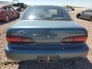 1995 Chevrolet Prizm z VIN 1Y1SK5282SZ023390, wystawiony jako Copart lot #66946265 z przebiegiem 99 476 mil mil oraz Czysty tytuł • Clean title. Historia ofert i sprzedaży dostępna na DreamBid. Obrazek 6.