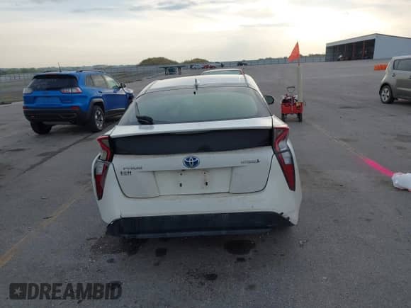 2016 Toyota Prius Two z VIN JTDKBRFU2G3522042, wystawiony jako IAAI lot #43234763 z przebiegiem 89 388 mil mil oraz . Historia ofert i sprzedaży dostępna na DreamBid. Obrazek 17.