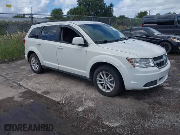 2015 Dodge Journey SXT with VIN 3C4PDDBGXFT606731, listed as a IAAI auction lot 43376713 with 124,087 mi miles and . Bid and sale history available at DreamBid. Image 1.