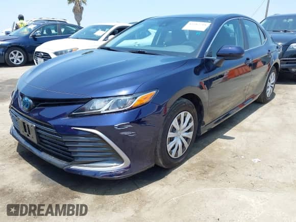 2022 Toyota Camry Hybrid LE with VIN 4T1C31AK0NU576130, listed as a IAAI auction lot 42382718 with 70,749 mi miles and . Bid and sale history available at DreamBid. Image 2.