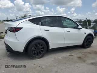 2023 Tesla Model Y Long Range with VIN 7SAYGDEE7PA140035, listed as a Copart auction lot 64046614 with 15,552 mi miles and Salvage title. Bid and sale history available at DreamBid. Image 3.