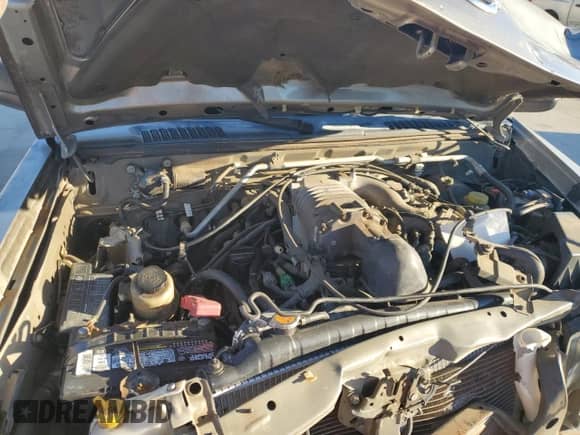 2002 Nissan Frontier SVE with VIN 1N6MD27Y22C389865, listed as a Copart auction lot 89300285 with 196,212 mi miles and Salvage title. Bid and sale history available at DreamBid. Image 12.