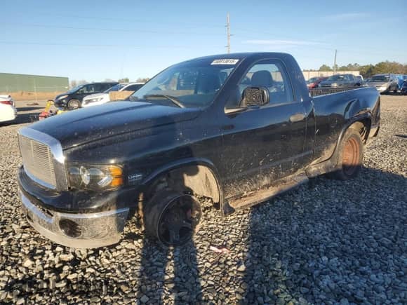 2003 Dodge 1500 ST with VIN 1D7HA16D73J666258, listed as a Copart auction lot 88913815 with 188,452 mi miles and Salvage title. Bid and sale history available at DreamBid. Image 1.