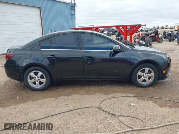 2014 Chevrolet Cruze 1LT с VIN 1G1PC5SB6E7351634, выставлен на аукционе IAAI как лот 43114165 с пробегом 111 804 миль миль и . История ставок и продаж доступна на DreamBid. Изображение 13.