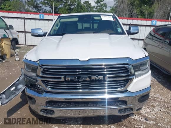 2021 Ram 1500 Laramie with VIN 1C6RREJT6MN628714, listed as a IAAI auction lot 42075167 with 64,974 mi miles and . Bid and sale history available at DreamBid. Image 12.