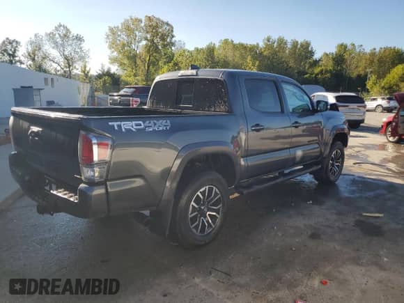 2021 Toyota Tacoma SR with VIN 3TMCZ5AN6MM394116, listed as a Copart auction lot 71531095 with 32,096 mi miles and Salvage title. Bid and sale history available at DreamBid. Image 3.