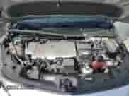 2018 Toyota Prius Plus z VIN JTDKARFP8J3098676, wystawiony jako Copart lot #81954365 z przebiegiem 65 893 mil mil oraz Szkoda całkowita • Salvage title. Historia ofert i sprzedaży dostępna na DreamBid. Obrazek 11.