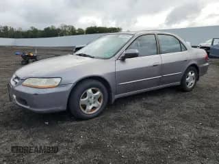 2000 Honda Accord EX with VIN 1HGCG165XYA088984, listed as a Copart auction lot 80502945 with 182,650 mi miles and Salvage title. Bid and sale history available at DreamBid. Image 1.