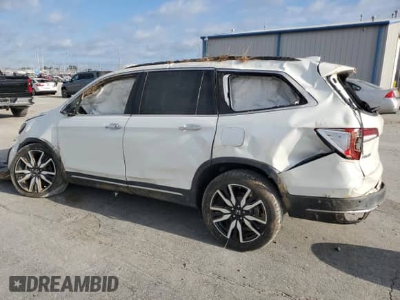 2020 Honda Pilot Touring 7-Passenger с VIN 5FNYF5H69LB009616, выставлен на аукционе Copart как лот 62480035 с пробегом Не указан миль и Списание • Salvage title. История ставок и продаж доступна на DreamBid. Изображение 2.