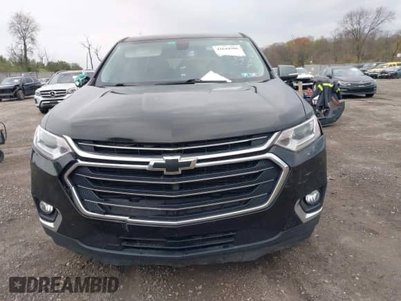 2018 Chevrolet Traverse LT z VIN 1GNEVHKW3JJ144443, wystawiony jako IAAI lot #41644506 z przebiegiem 68 081 mil mil oraz . Historia ofert i sprzedaży dostępna na DreamBid. Obrazek 11.