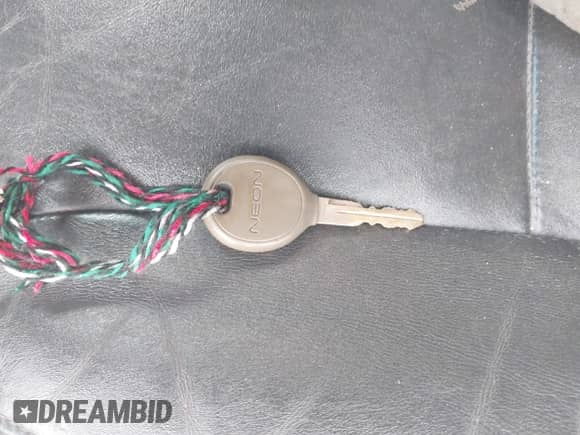 2002 Dodge Neon ES z VIN 1B3AS56CX2D651887, wystawiony jako IAAI lot #42758801 z przebiegiem 189 156 mil mil oraz . Historia ofert i sprzedaży dostępna na DreamBid. Obrazek 11.