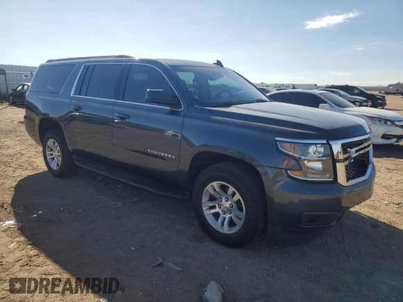 2020 Chevrolet Suburban LT with VIN 1GNSKHKC4LR161158, listed as a Copart auction lot 82126945 with 95,309 mi miles and Salvage title. Bid and sale history available at DreamBid. Image 4.