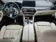 2021 BMW 5 Series 530i xDrive with VIN WBA13BJ08MWW97715, listed as a Copart auction lot 71586745 with 64,340 mi miles and Salvage title. Bid and sale history available at DreamBid. Image 8.