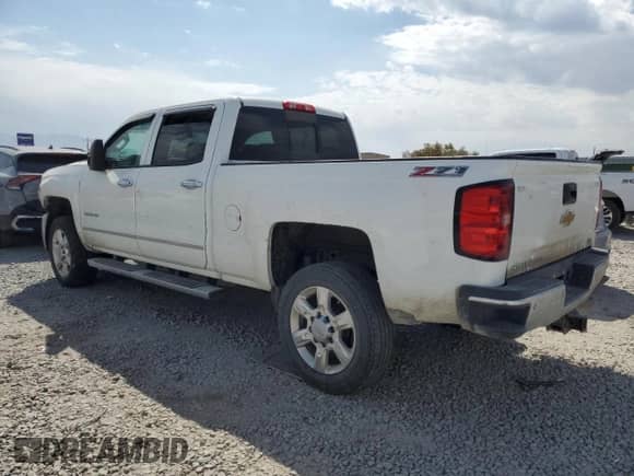 2015 Chevrolet Silverado 3500HD LTZ с VIN 1GC4K0E89FF135364, выставлен на аукционе Copart как лот 67867825 с пробегом 164 824 миль миль и Списание • Salvage title. История ставок и продаж доступна на DreamBid. Изображение 2.