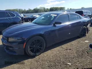 2015 Dodge Charger SE with VIN 2C3CDXBG3FH839993, listed as a Copart auction lot 70147505 with 162,671 mi miles and Salvage title. Bid and sale history available at DreamBid. Image 1.