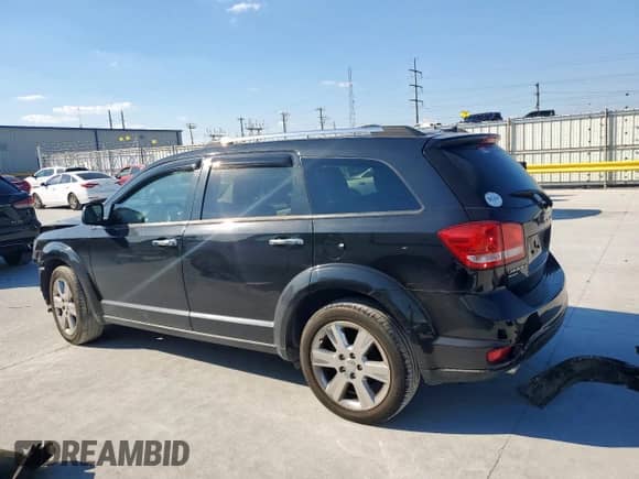2012 Dodge Journey Crew with VIN 3C4PDDDG1CT181621, listed as a Copart auction lot 84618085 with 31,985 mi miles and Salvage title. Bid and sale history available at DreamBid. Image 2.