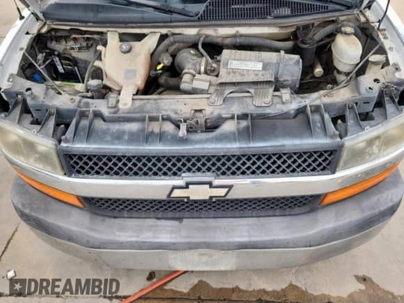 2008 Chevrolet Express Cargo with VIN 1GCFG154X81188880, listed as a Copart auction lot 70361085 with 327,309 mi miles and Salvage title. Bid and sale history available at DreamBid. Image 12.