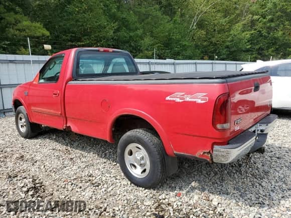 2002 Ford F-150 XL with VIN 2FTRF18W42CA66874, listed as a Copart auction lot 68011415 with 79,613 mi miles and Clean title. Bid and sale history available at DreamBid. Image 2.