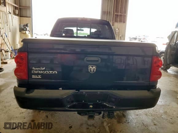 2007 Dodge Dakota SLT с VIN 1D7HE48K87S253511, выставлен на аукционе Copart как лот 60333275 с пробегом 135 574 миль миль и Списание • Salvage title. История ставок и продаж доступна на DreamBid. Изображение 6.