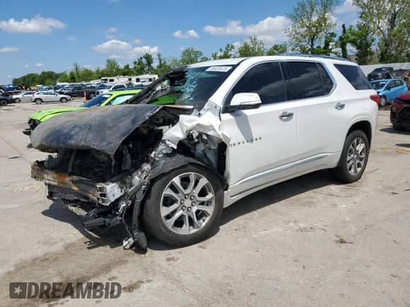 2021 Chevrolet Traverse Premier с VIN 1GNEVKKW2MJ138490, выставлен на аукционе Copart как лот 55822675 с пробегом Не указан миль и Списание • Salvage title. История ставок и продаж доступна на DreamBid. Изображение 1.