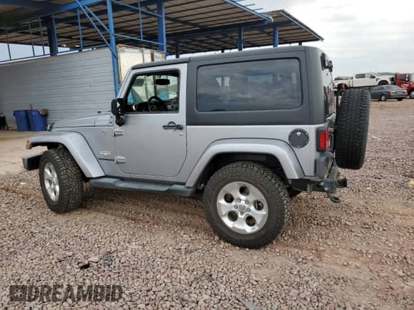 2014 Jeep Wrangler Sahara с VIN 1C4AJWBG5EL221498, выставлен на аукционе Copart как лот 69698425 с пробегом 43 821 миль миль и Списание • Salvage title. История ставок и продаж доступна на DreamBid. Изображение 2.