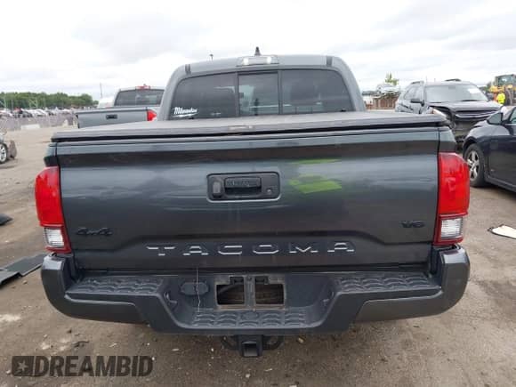 2023 Toyota Tacoma SR with VIN 3TMCZ5ANXPM538495, listed as a IAAI auction lot 42993850 with 41,728 mi miles and . Bid and sale history available at DreamBid. Image 17.