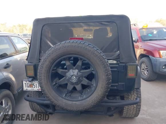 2011 Jeep Wrangler Rubicon with VIN 1J4BA6D10BL628180, listed as a IAAI auction lot 41711065 with 155,940 mi miles and . Bid and sale history available at DreamBid. Image 16.