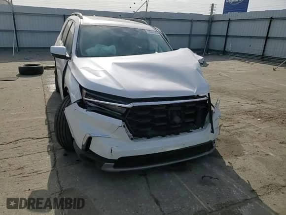 2025 Honda Pilot Elite with VIN 5FNYG1H81SB020096, listed as a Copart auction lot 70533595 with 12,951 mi miles and Salvage title. Bid and sale history available at DreamBid. Image 14.