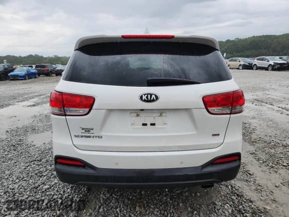 2016 Kia Sorento LX with VIN 5XYPG4A39GG029835, listed as a Copart auction lot 84273285 with 176,484 mi miles and Salvage title. Bid and sale history available at DreamBid. Image 6.