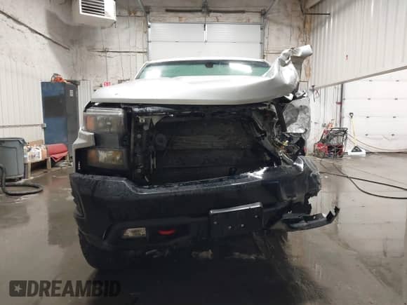 2020 Chevrolet Silverado 1500 Custom Trail Boss with VIN 3GCPYCEF7LG255928, listed as a IAAI auction lot 41109790 with 63,324 mi miles and . Bid and sale history available at DreamBid. Image 12.