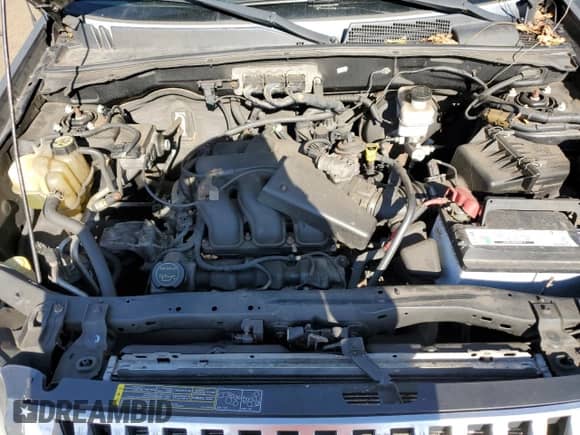 2008 Mercury Mariner Premier with VIN 4M2CU971X8KJ35114, listed as a Copart auction lot 70386905 with 148,184 mi miles and Salvage title. Bid and sale history available at DreamBid. Image 12.